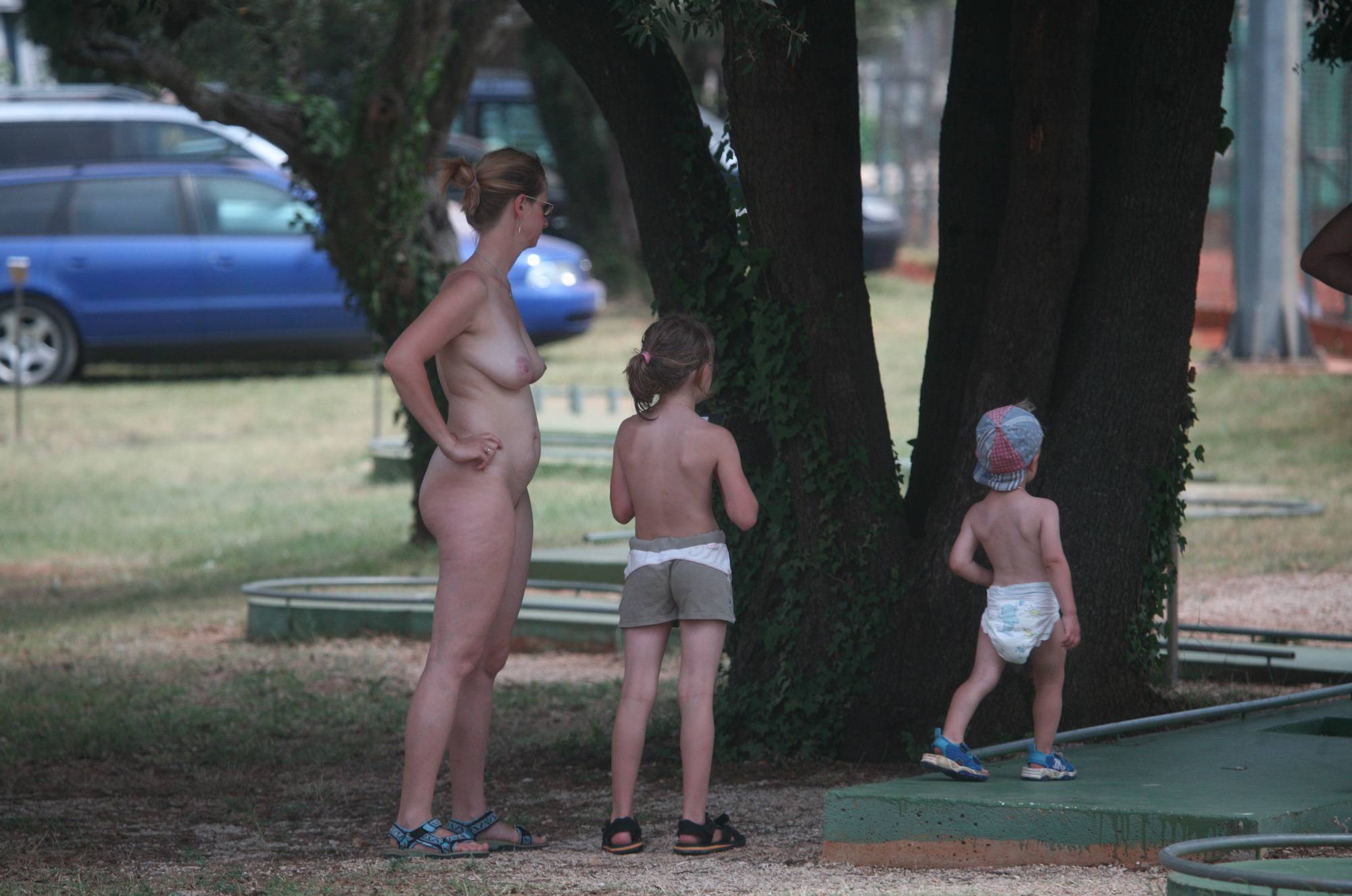 Pure Nudism Images Nudist Family Mini-Golfing - 1