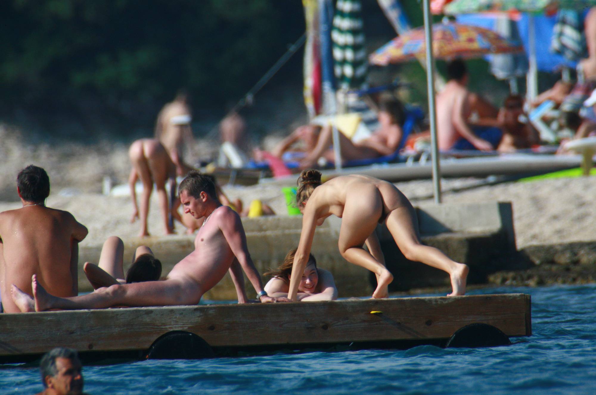 Nudist Slab Group Tanning - 1