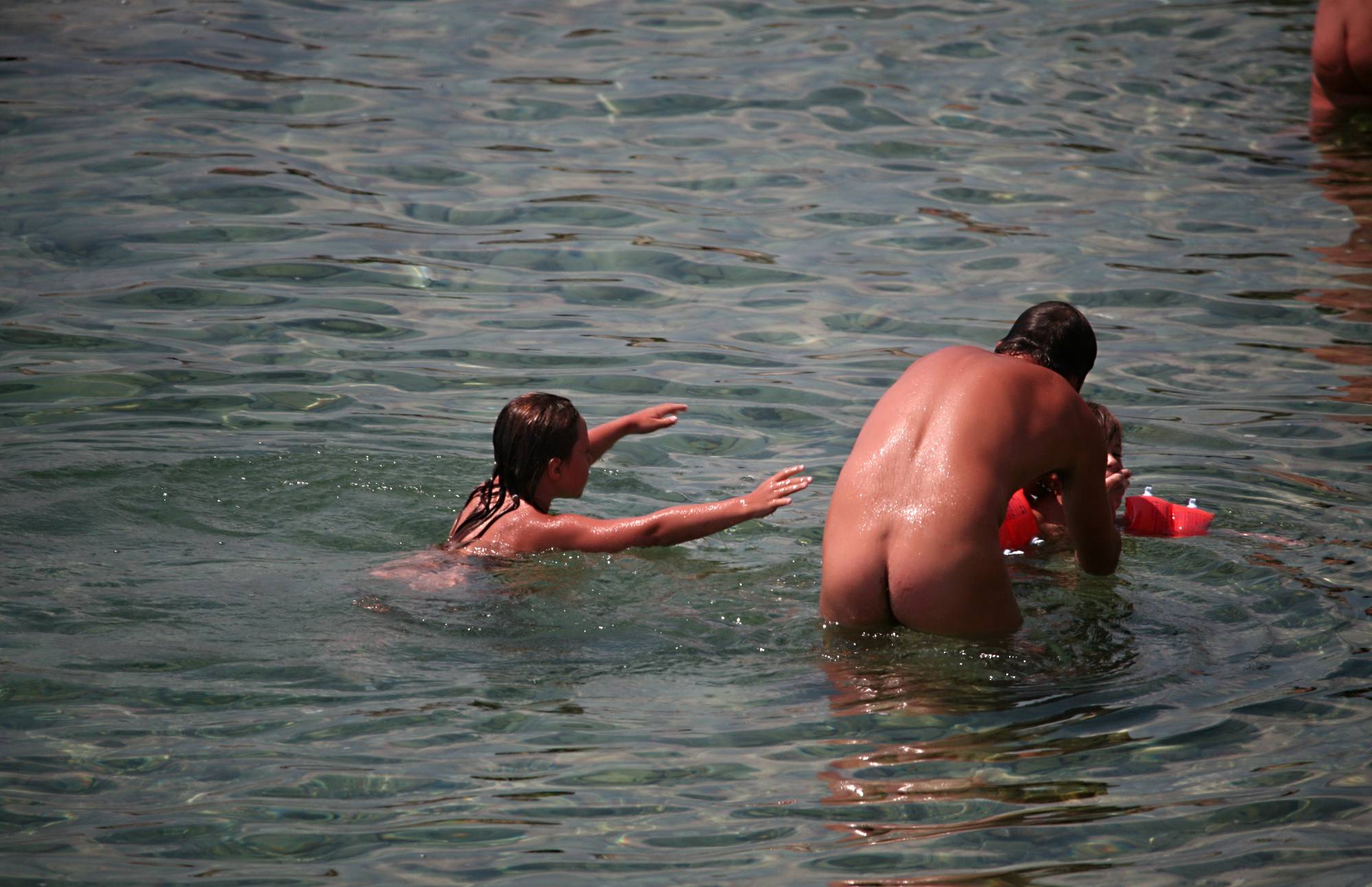 Pure Nudism Gallery Father and Two Kid Water - 2