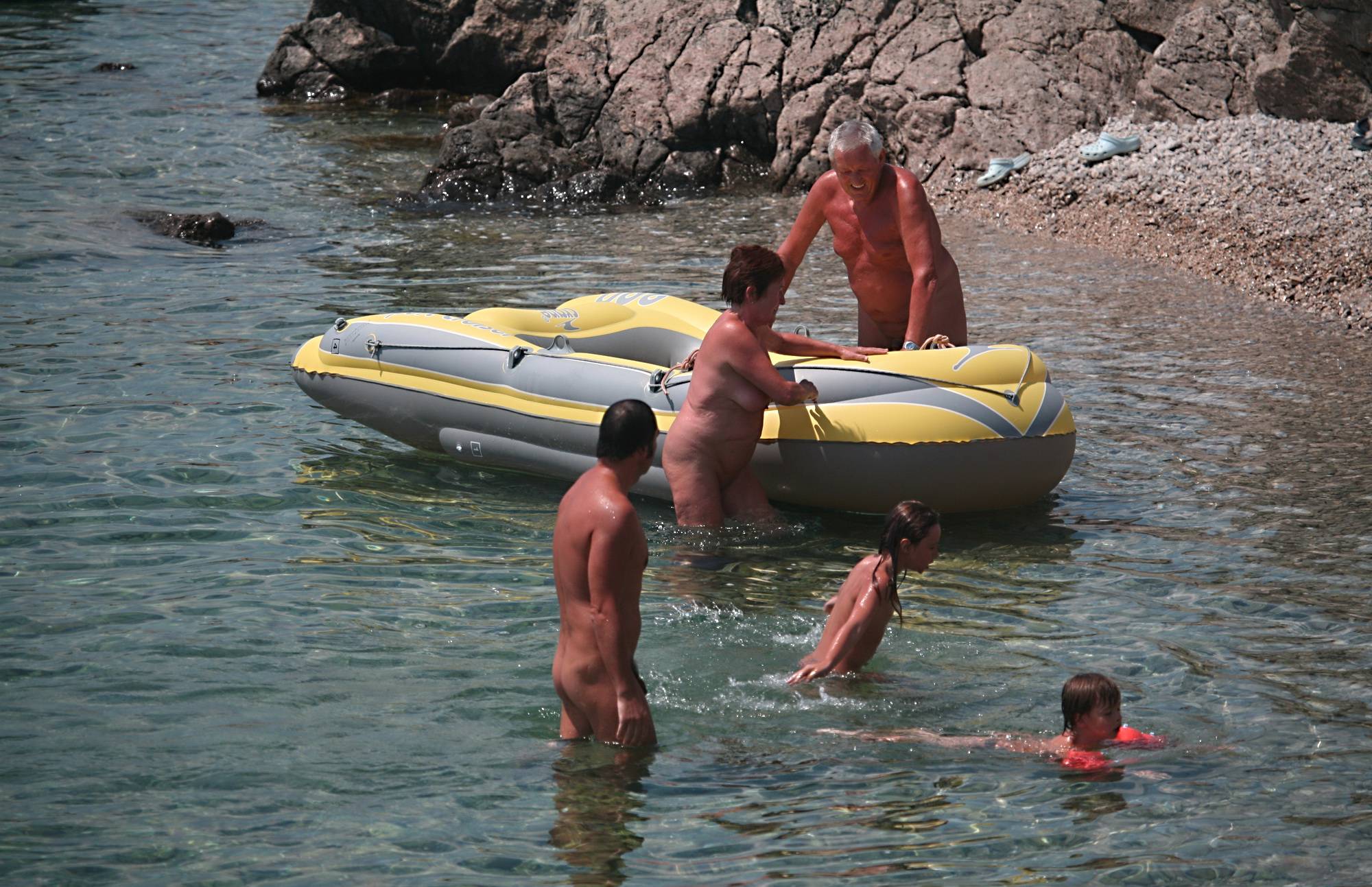 Purenudism Lone Nudist in Yellow Boat - 3