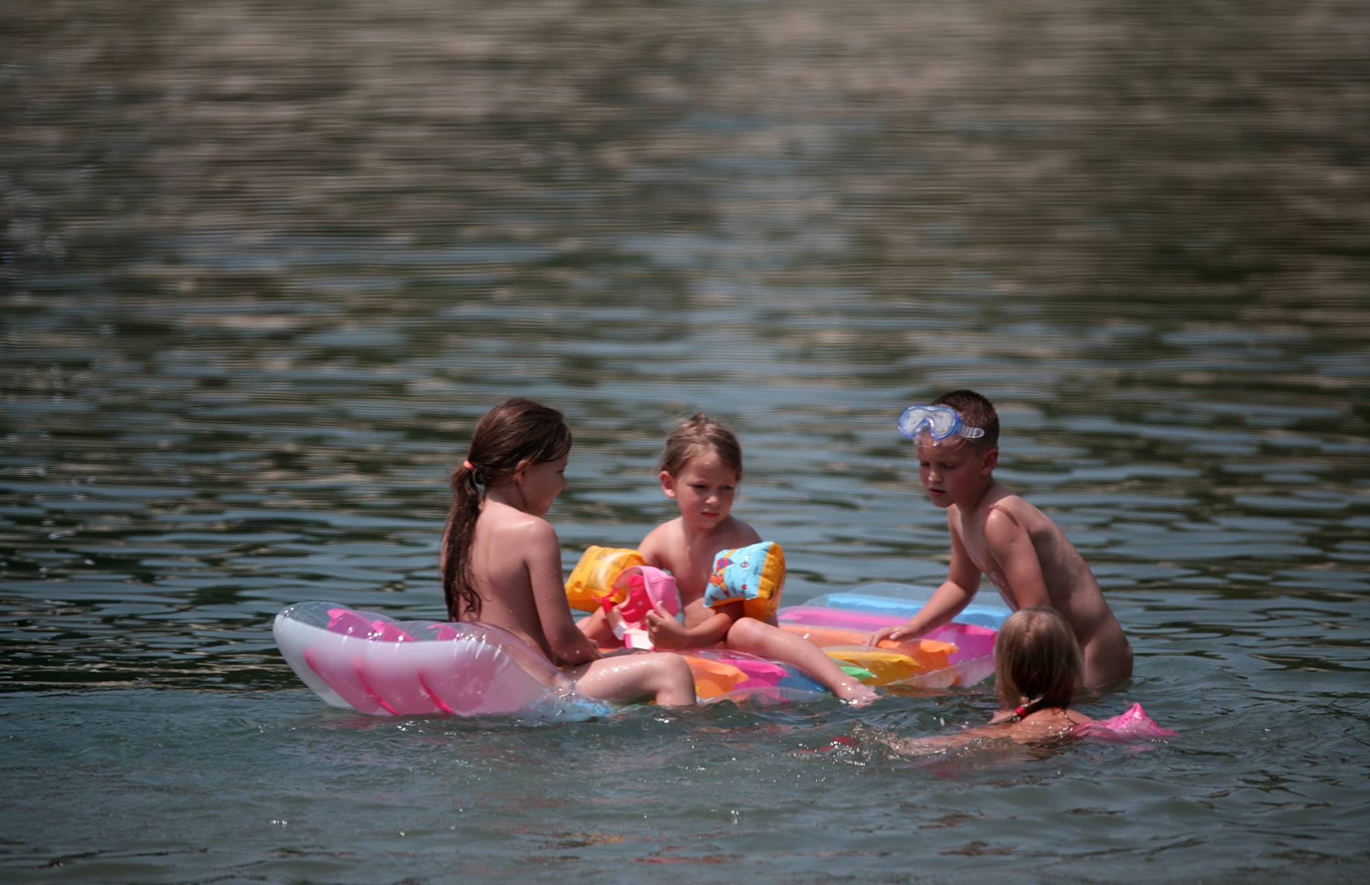 Relax Aboard A Floaty Raft - Purenudism Young - 1