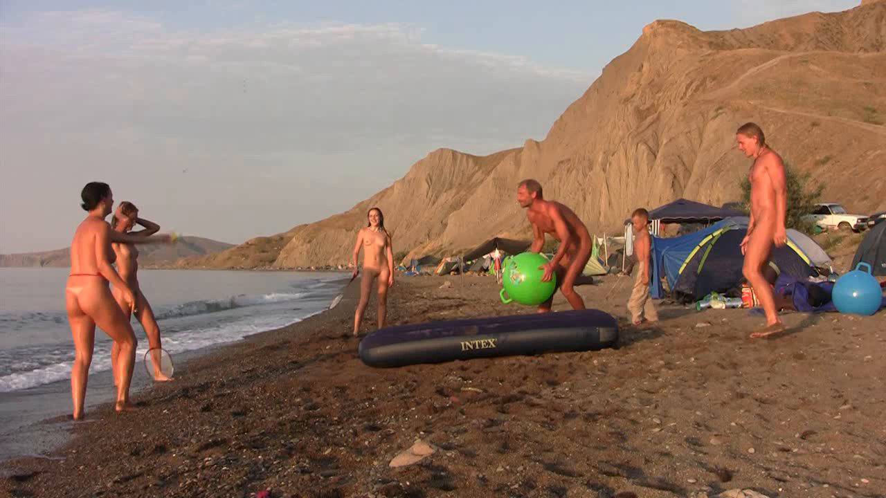 Nudist Group Young Naturists on a Nudist Beach - 2